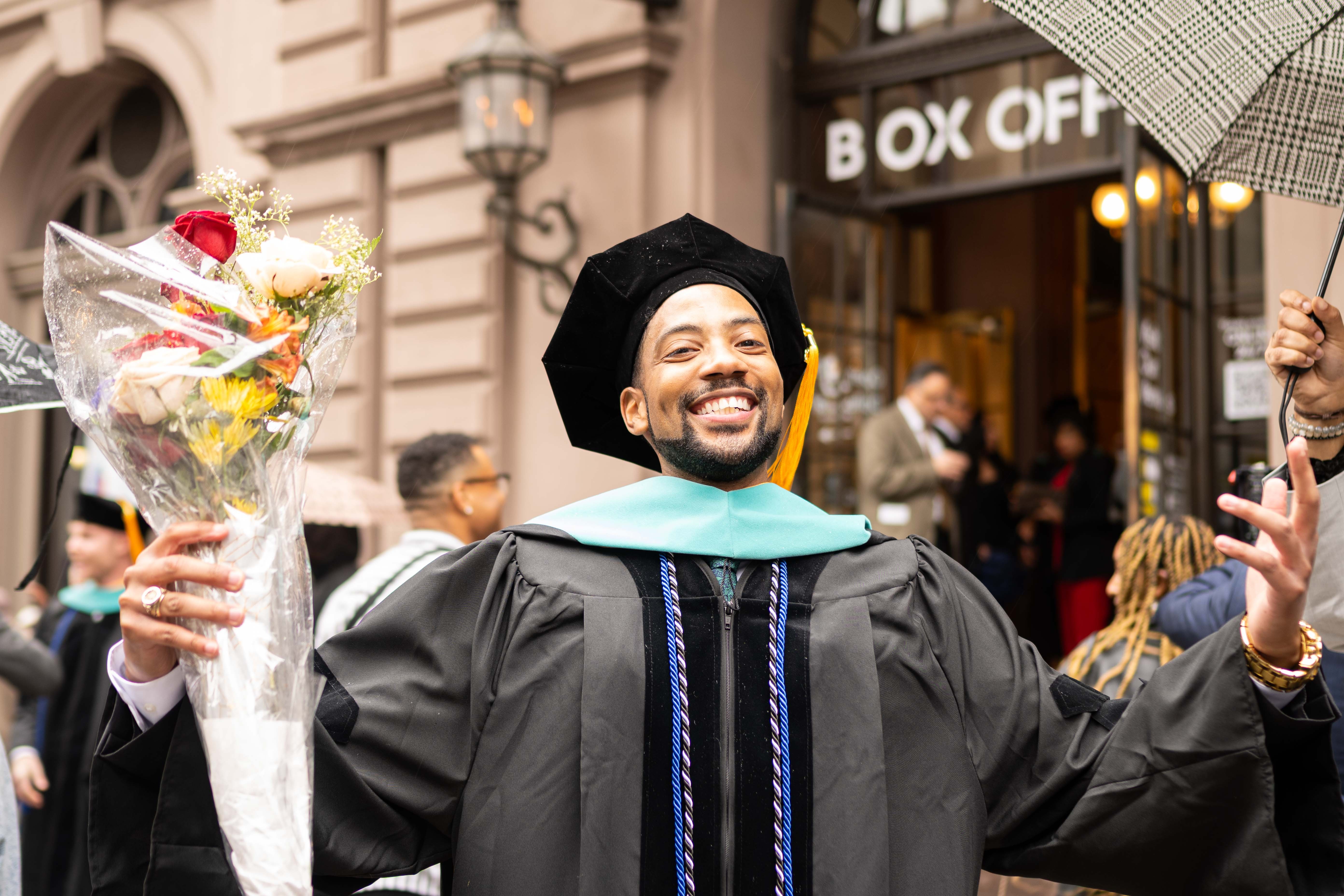 PCO grad and happy Edward Harris celebrates
