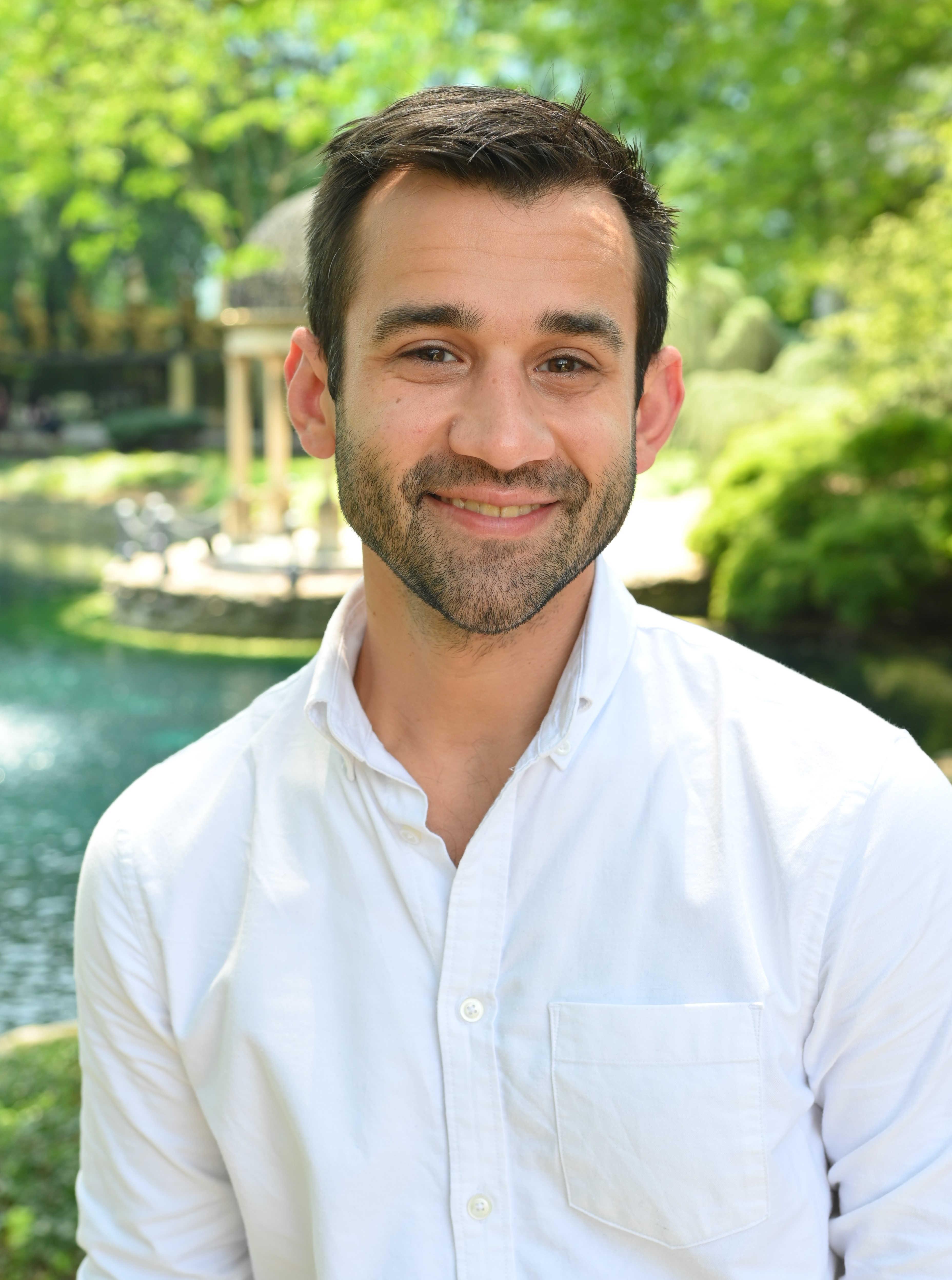 Aaron Roman in front of the gazebo