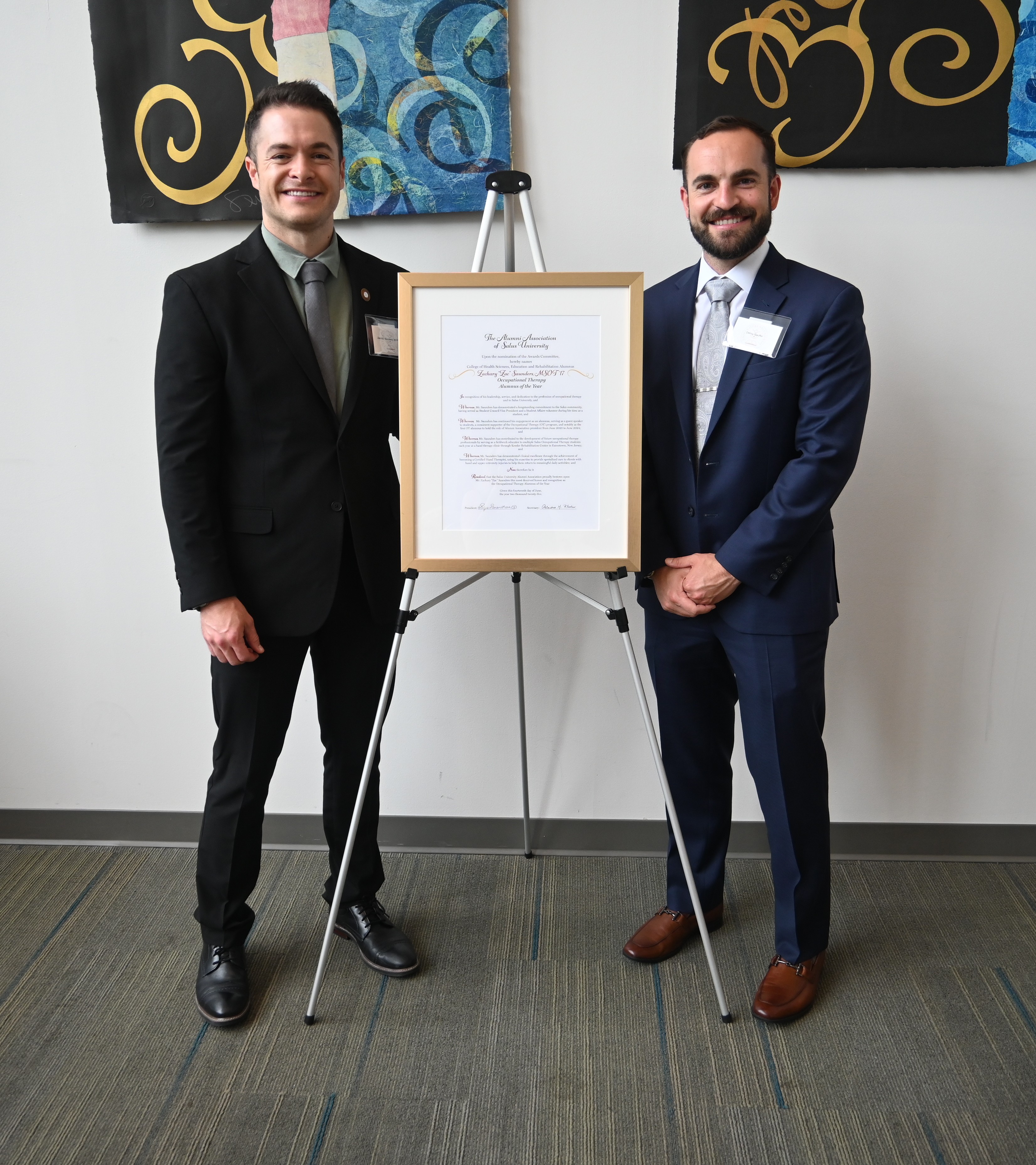 OT Zac Saunders and partner with award