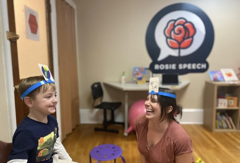 Amber Schafer with pediatric patient