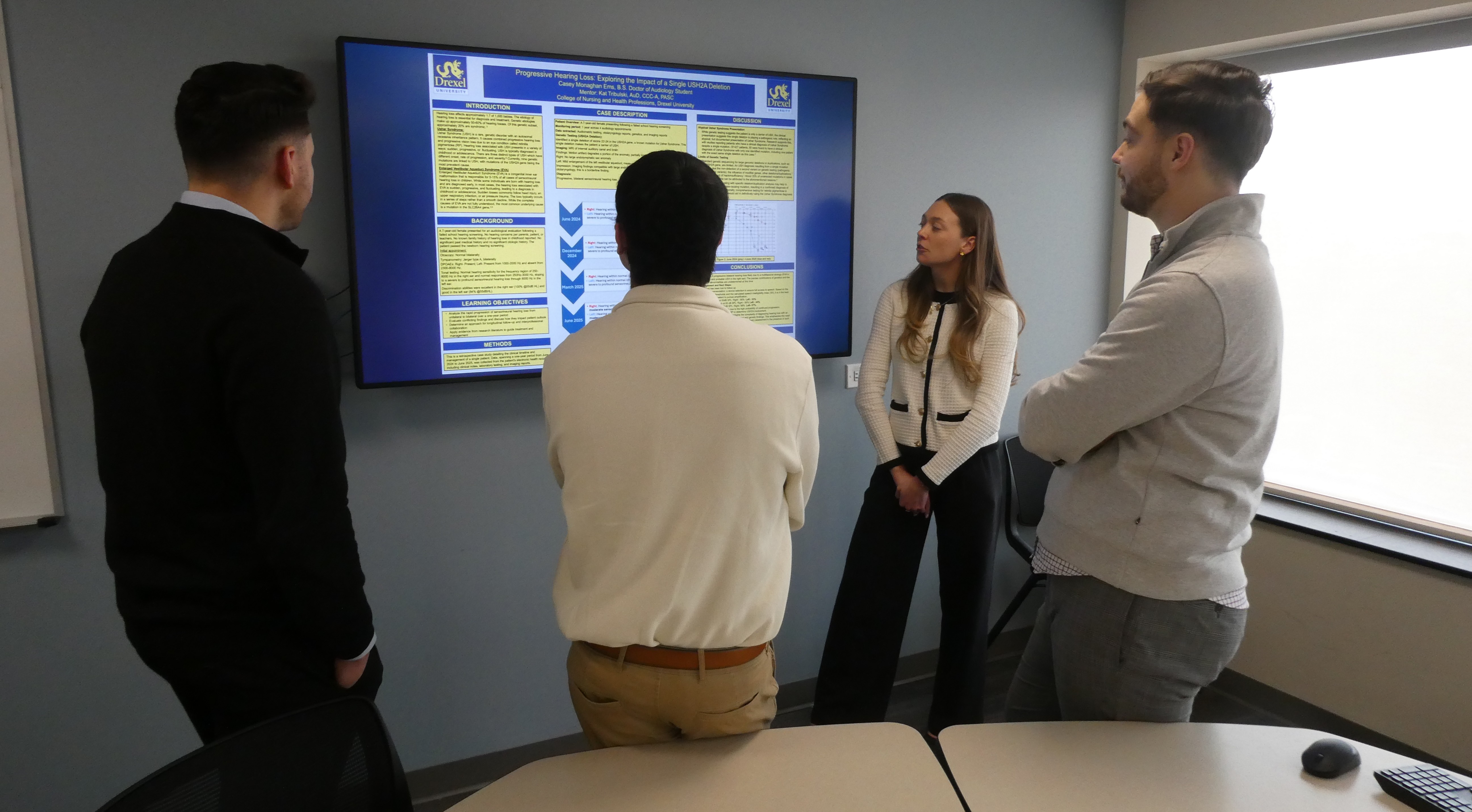 Casey Ems explaining her AUD poster pic1