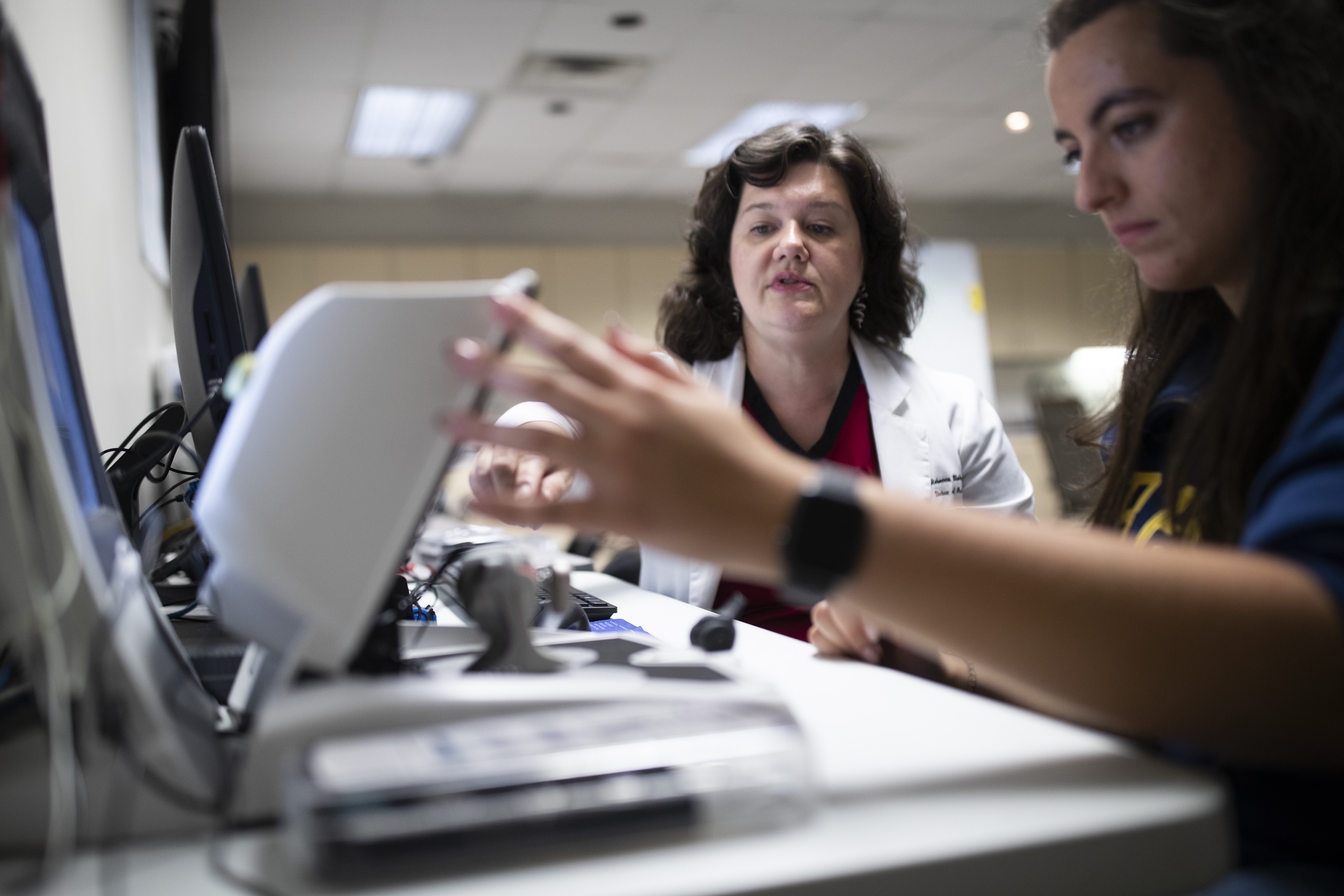 Dr. Blaha and student in testing lab pic1