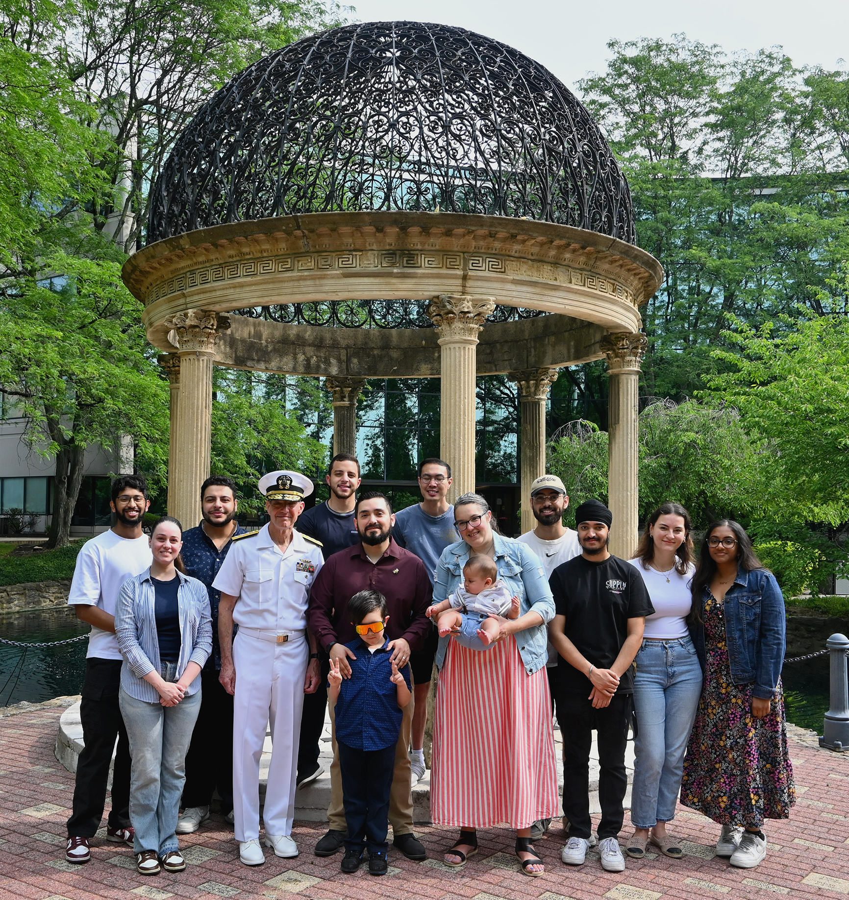 Walter Benitez and family in front of the gazebo