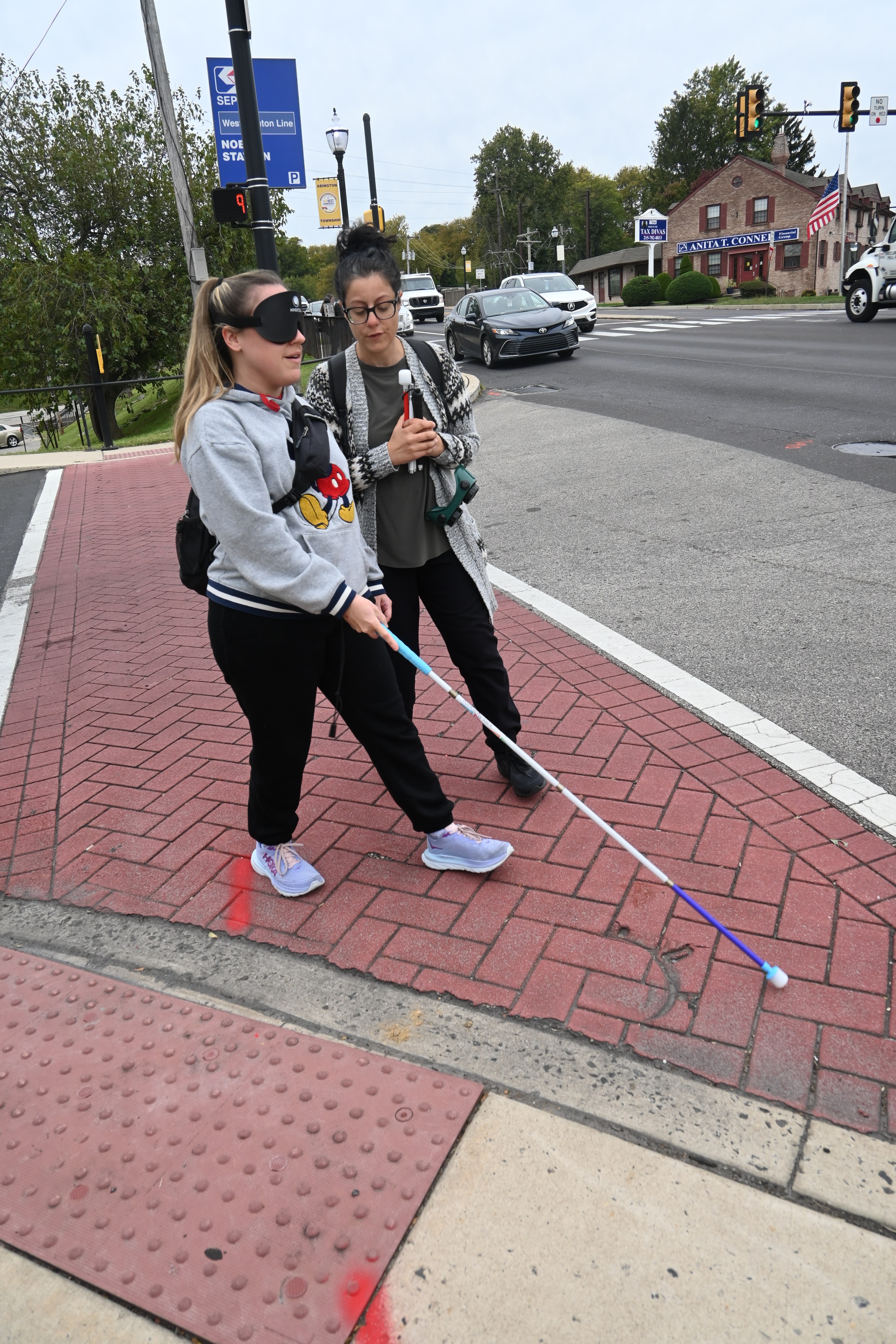 BLVS student navigates a city street with cane pic3