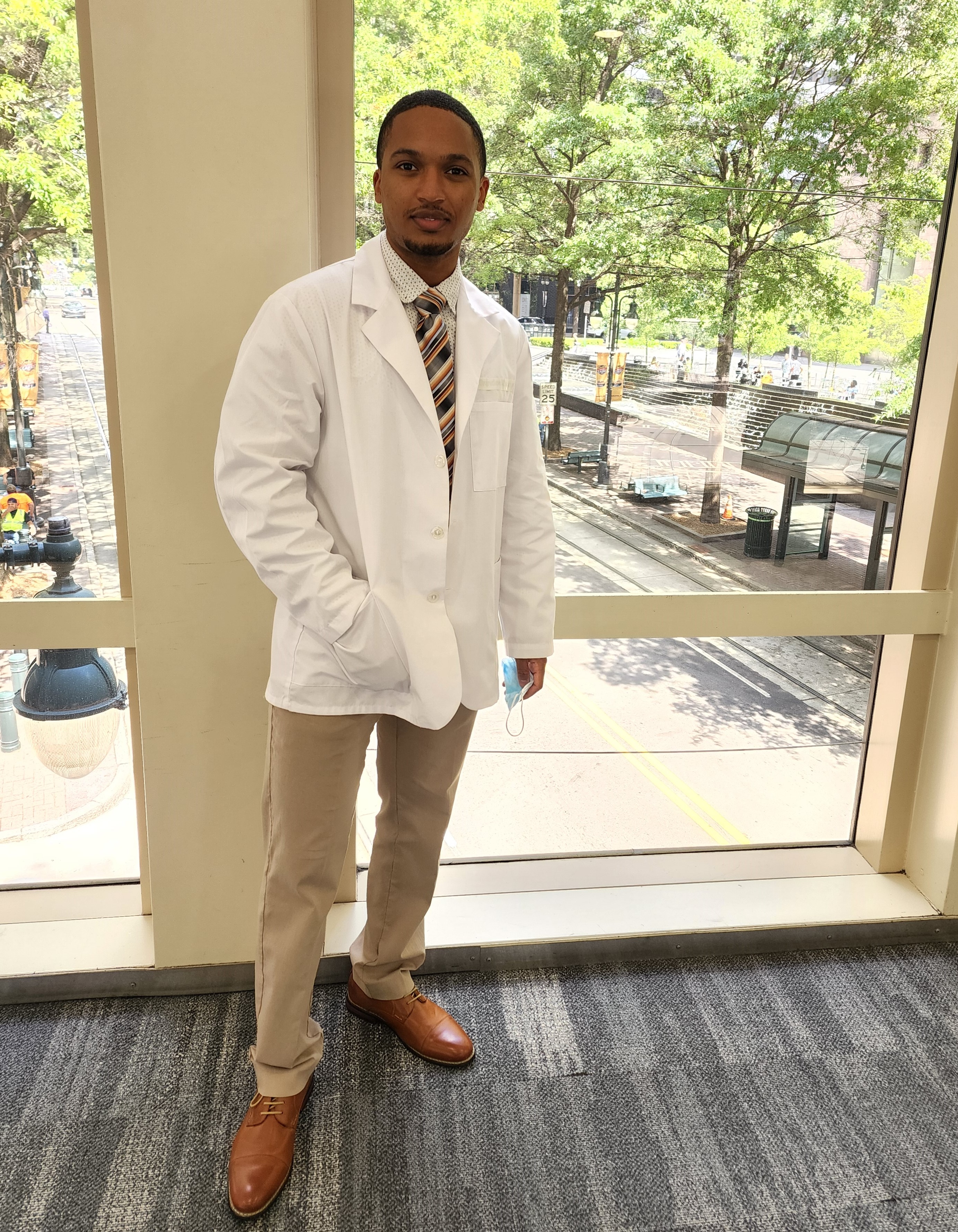 Brandon Garces in white coat