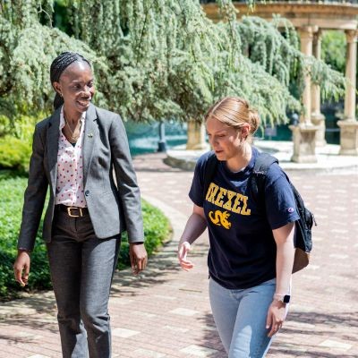 Dr. Ibironke and Maddy Edwards on campus thumb