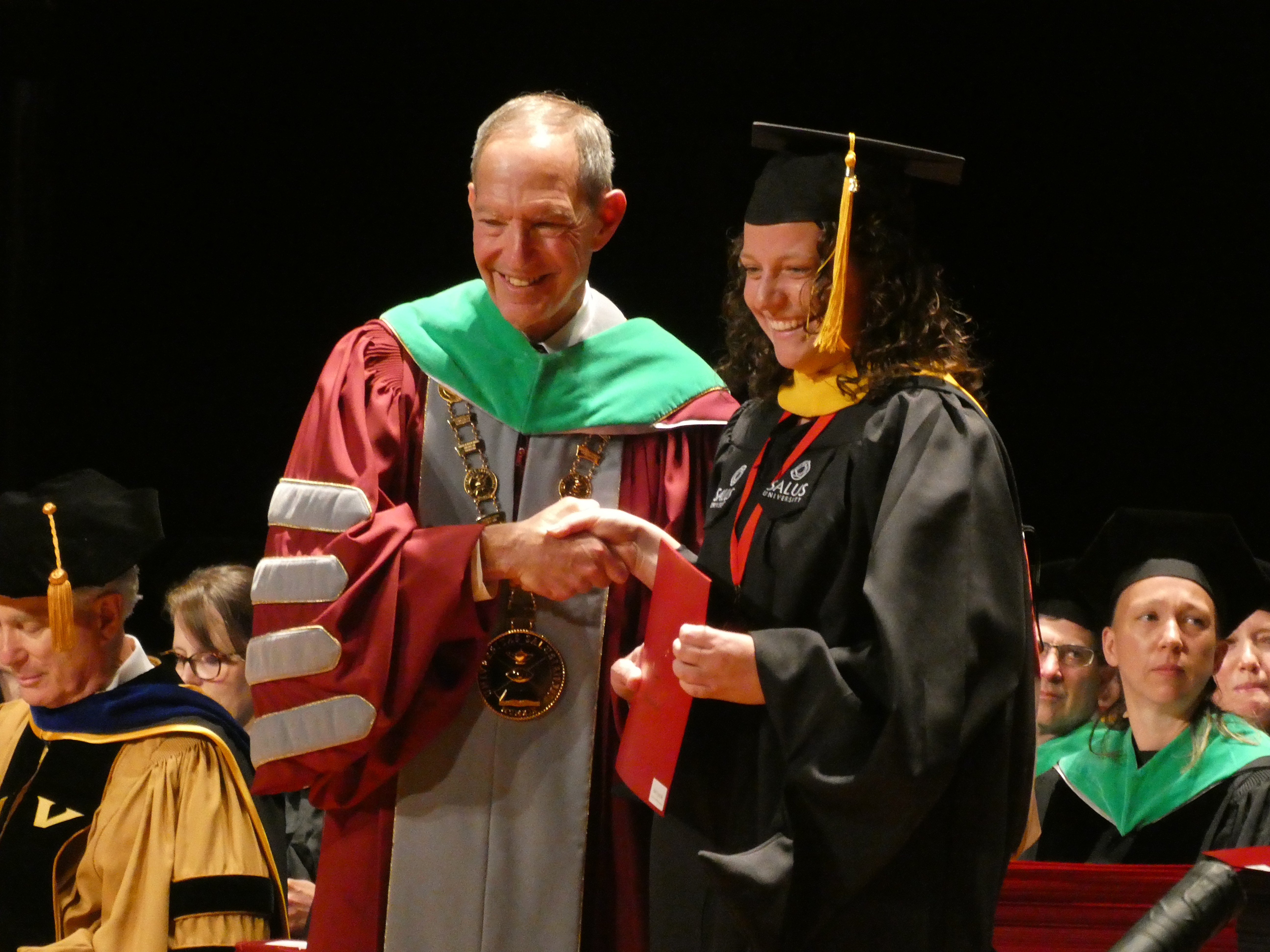 Molly Luckinbill with MHM at graduation