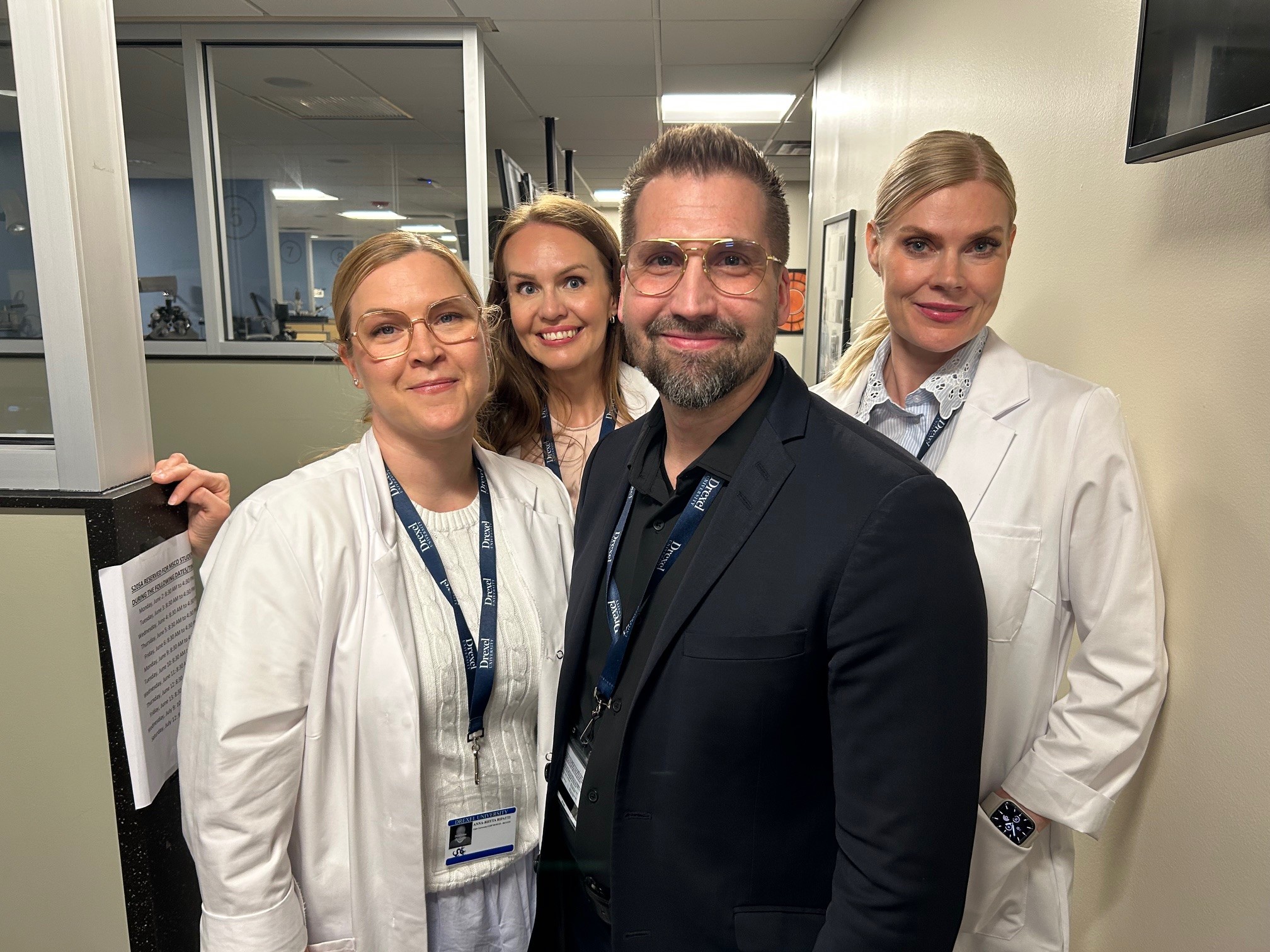 Three Finnish students with Dr. Andersson