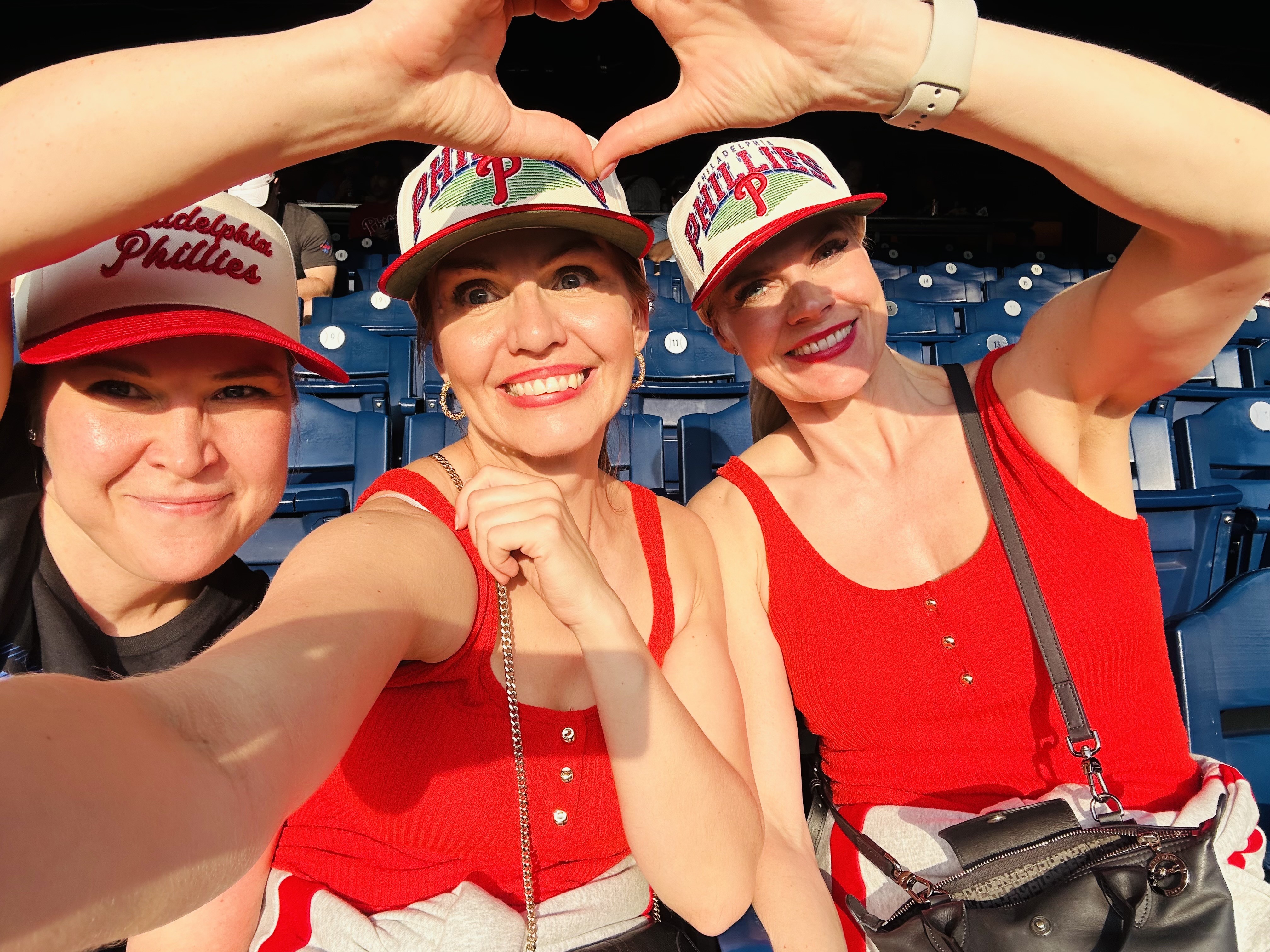 Three Finnish students at a Phillies game 