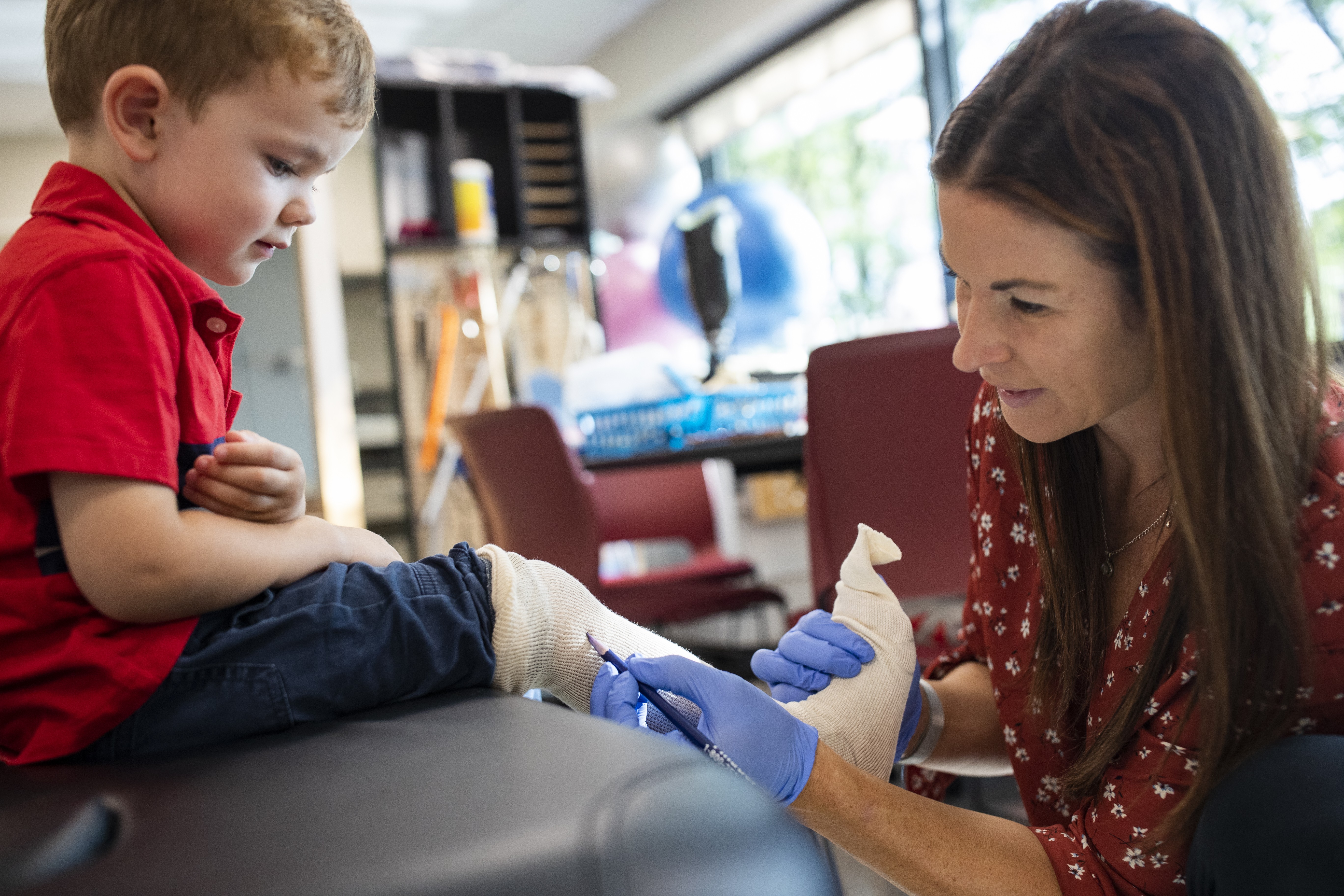 Julie Quinlan working with O&P child client