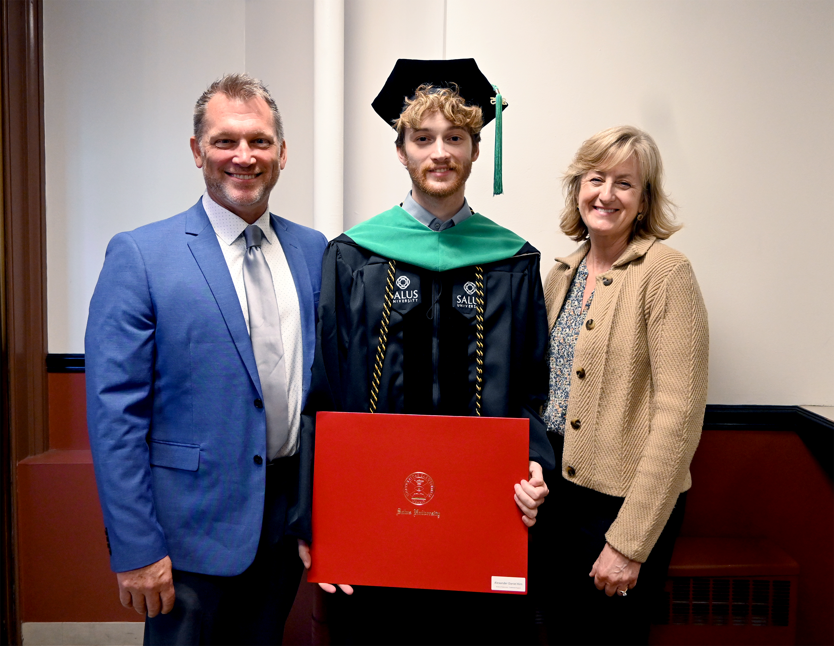 Alex Kirns and his parents