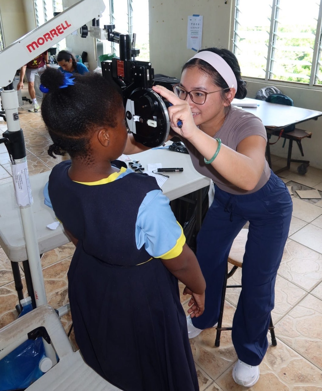 Kirsten Tran examining a patient pic1