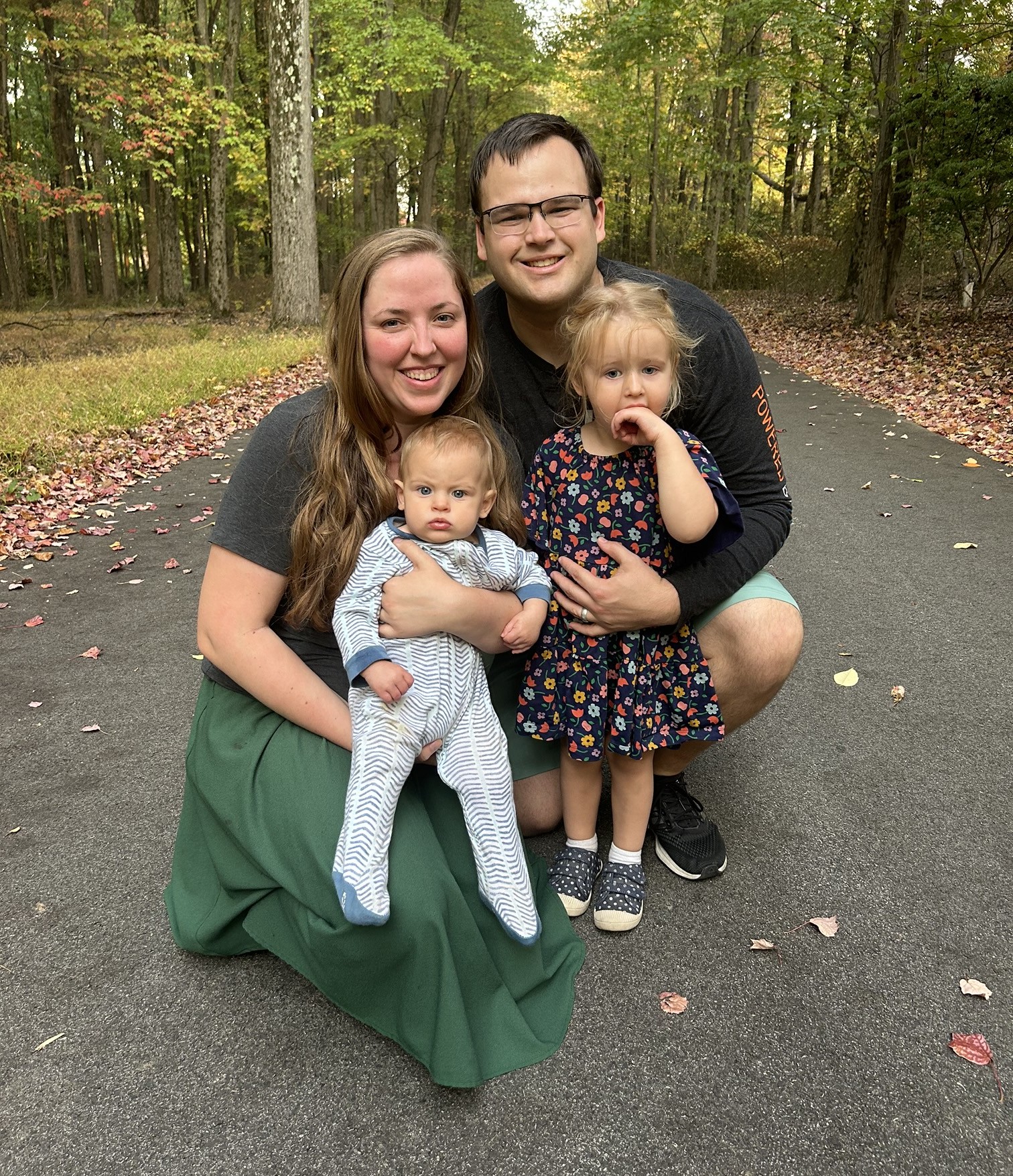 Logan Tonini with wife and two young daughters