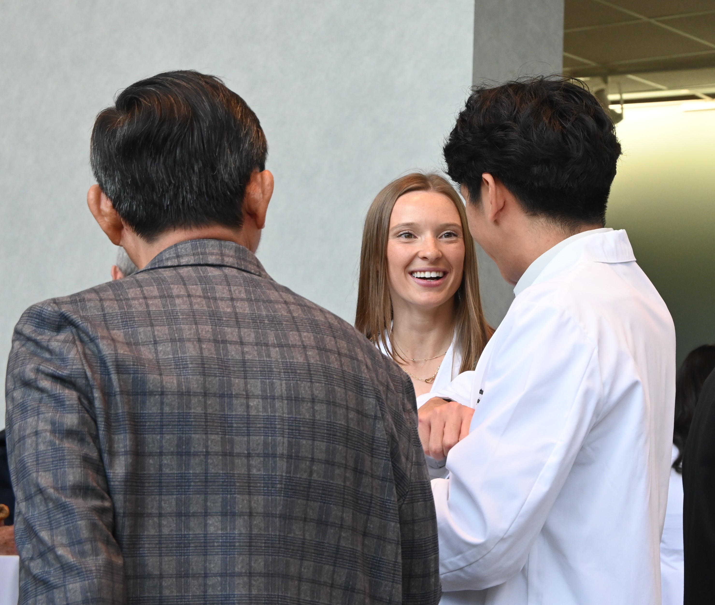 Ahna Kay long white coat reception pic2