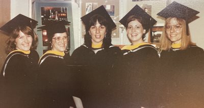 students in cap and gown