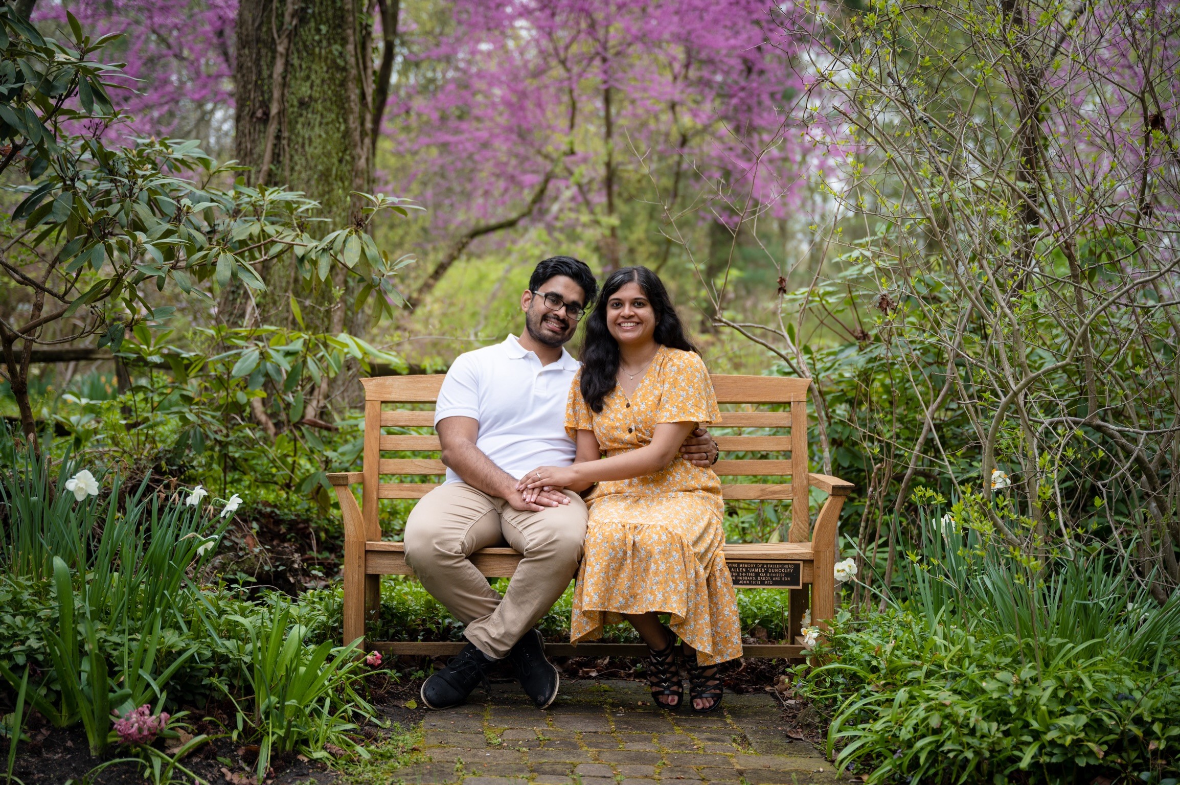 Mauli Chothani and husband sitting on a bench