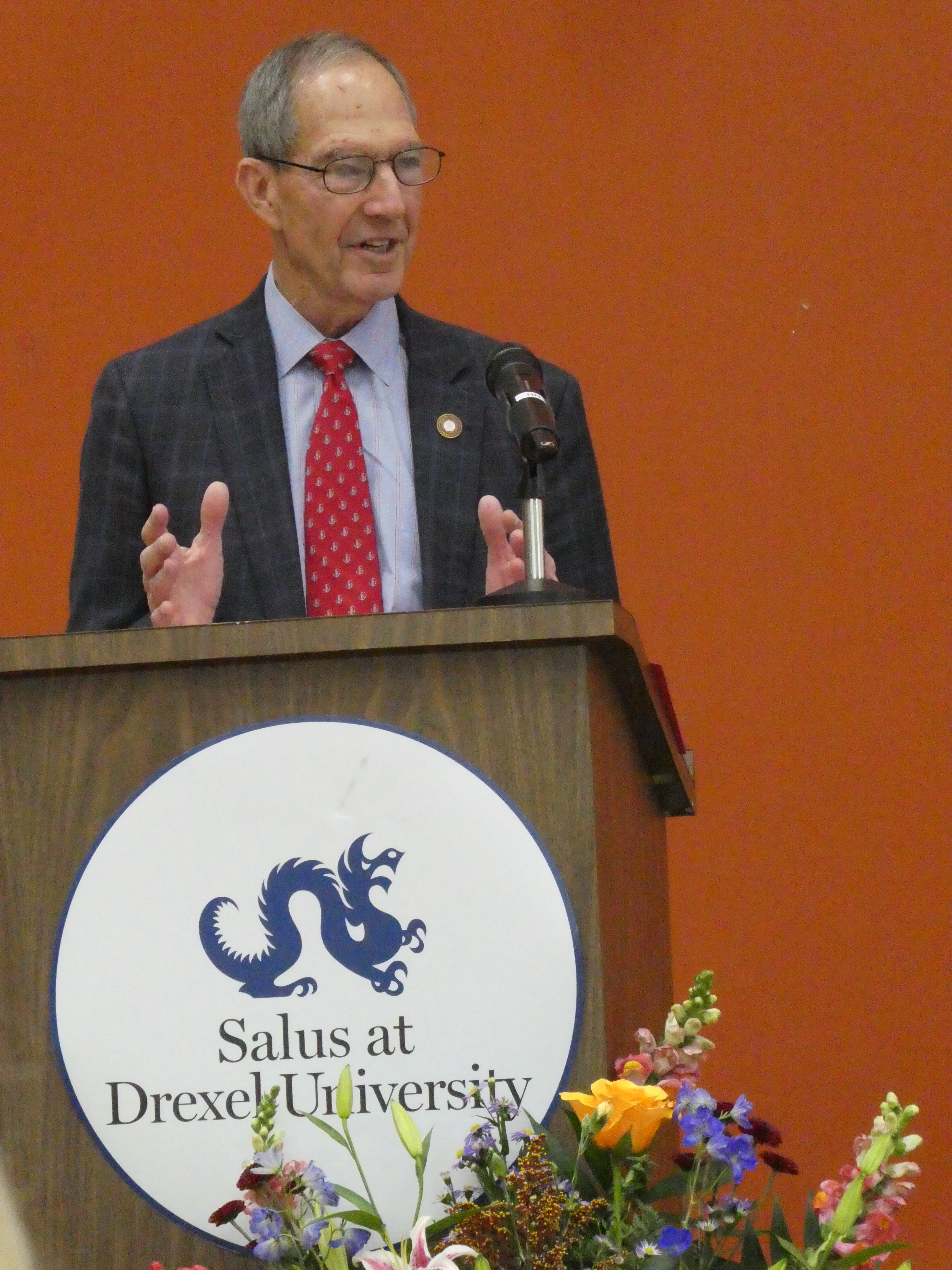 Dr. Mittelman at podium