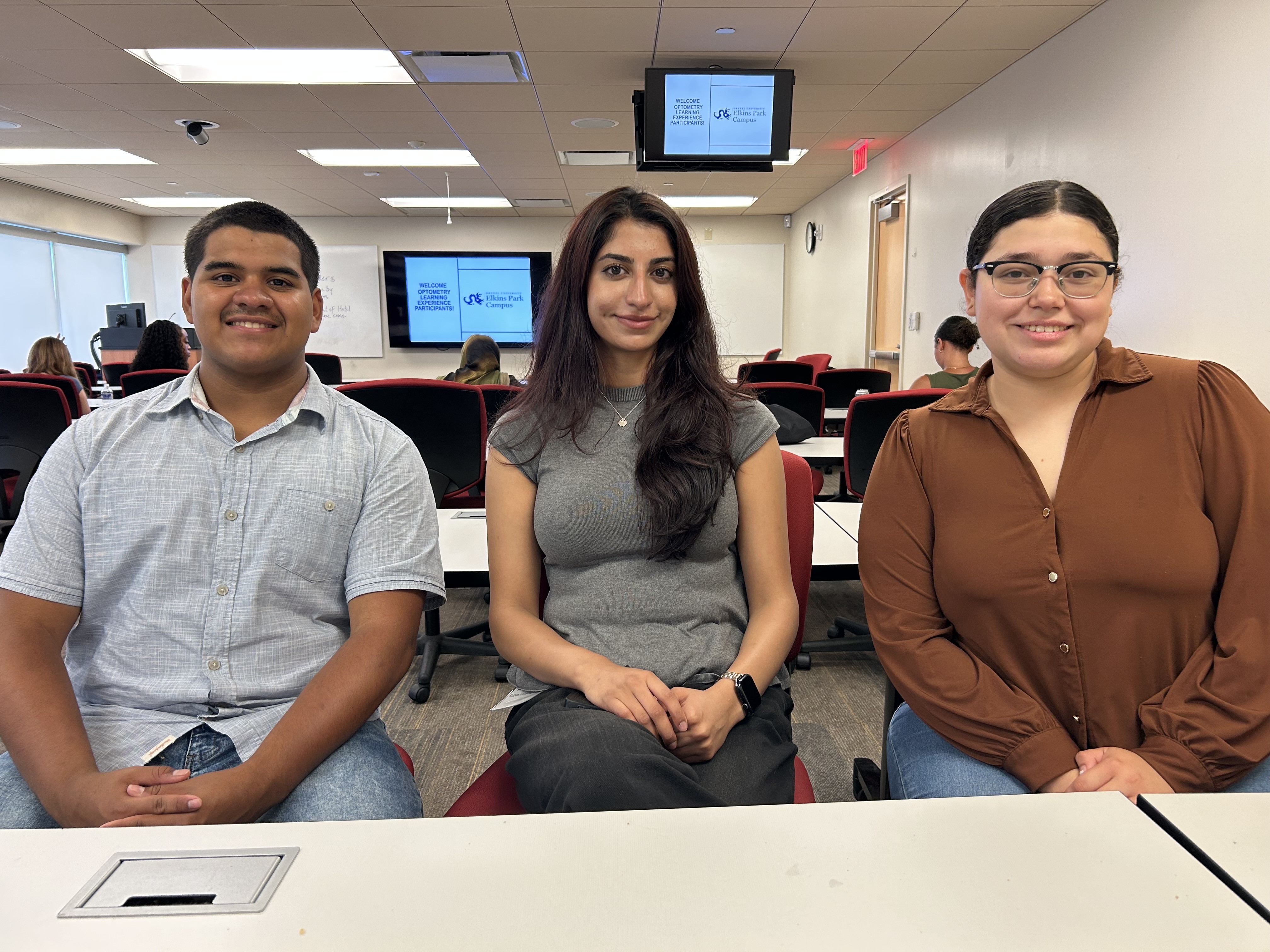 Three OLE students in classroom