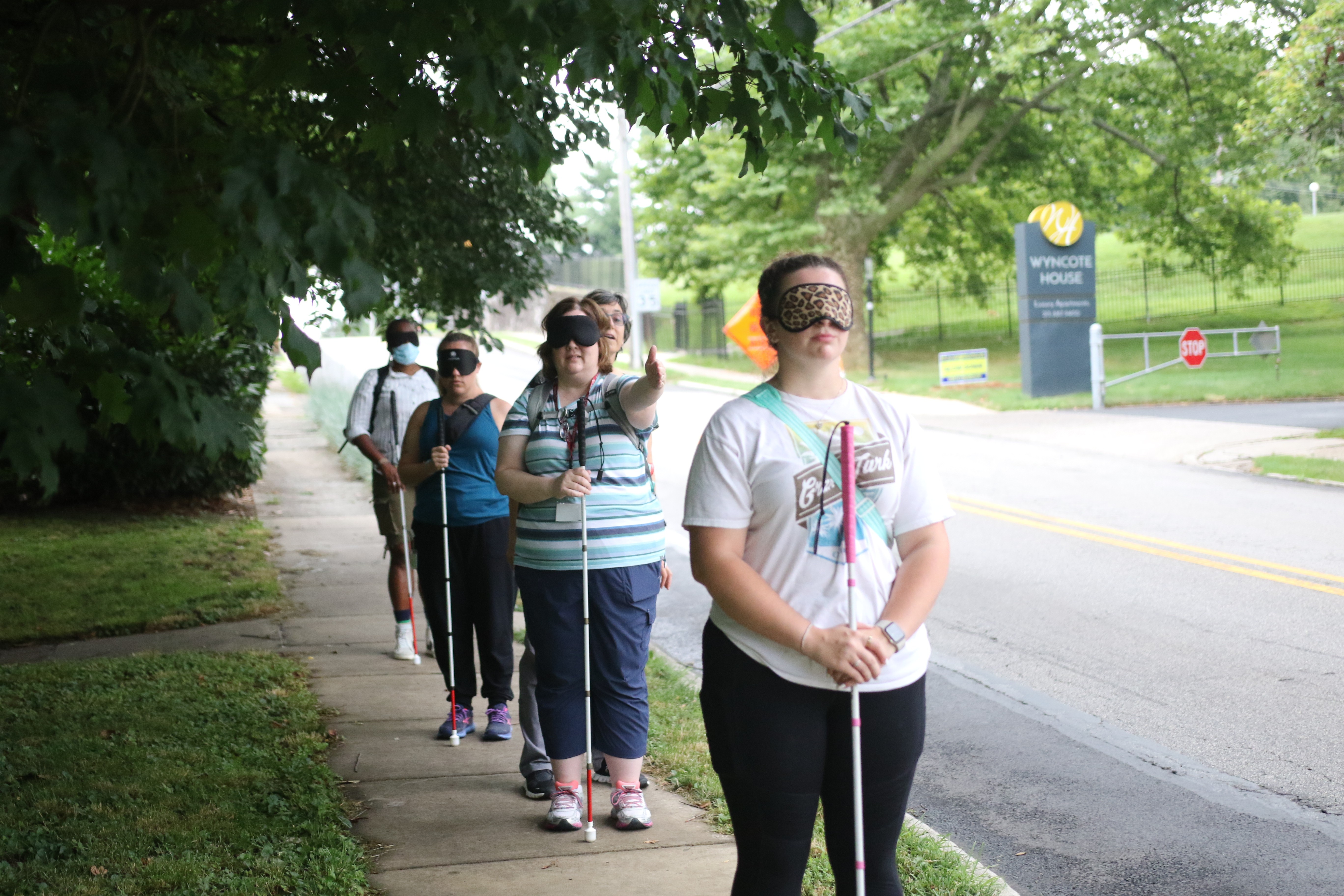 O&M students blindfolded in the field pic1