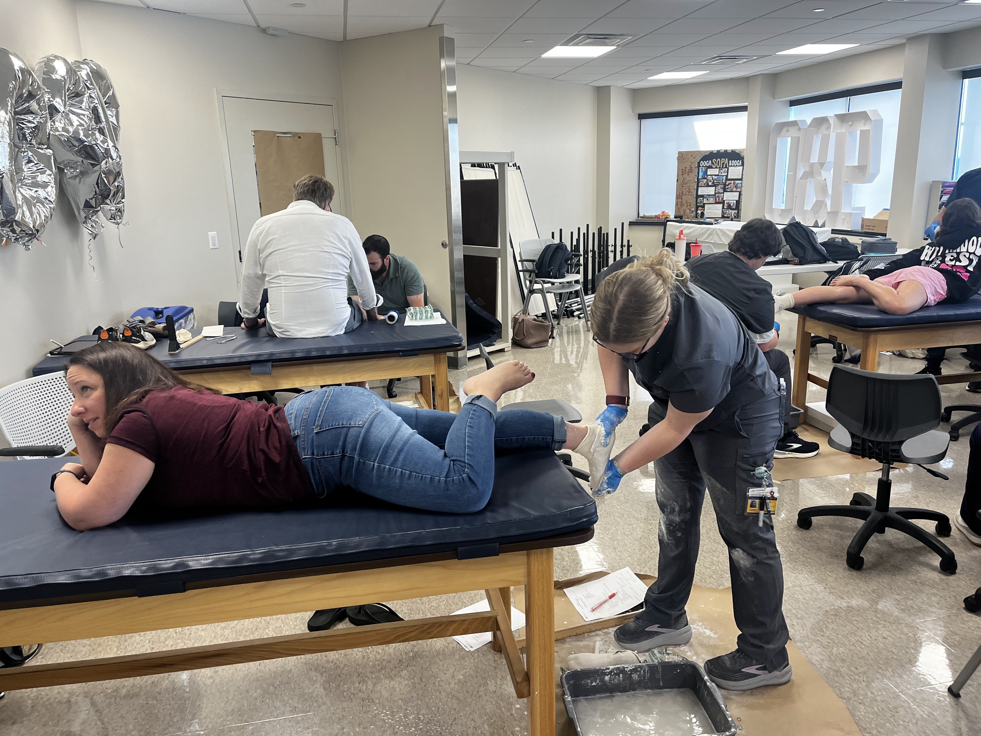 Patient model getting fitted by O&P student