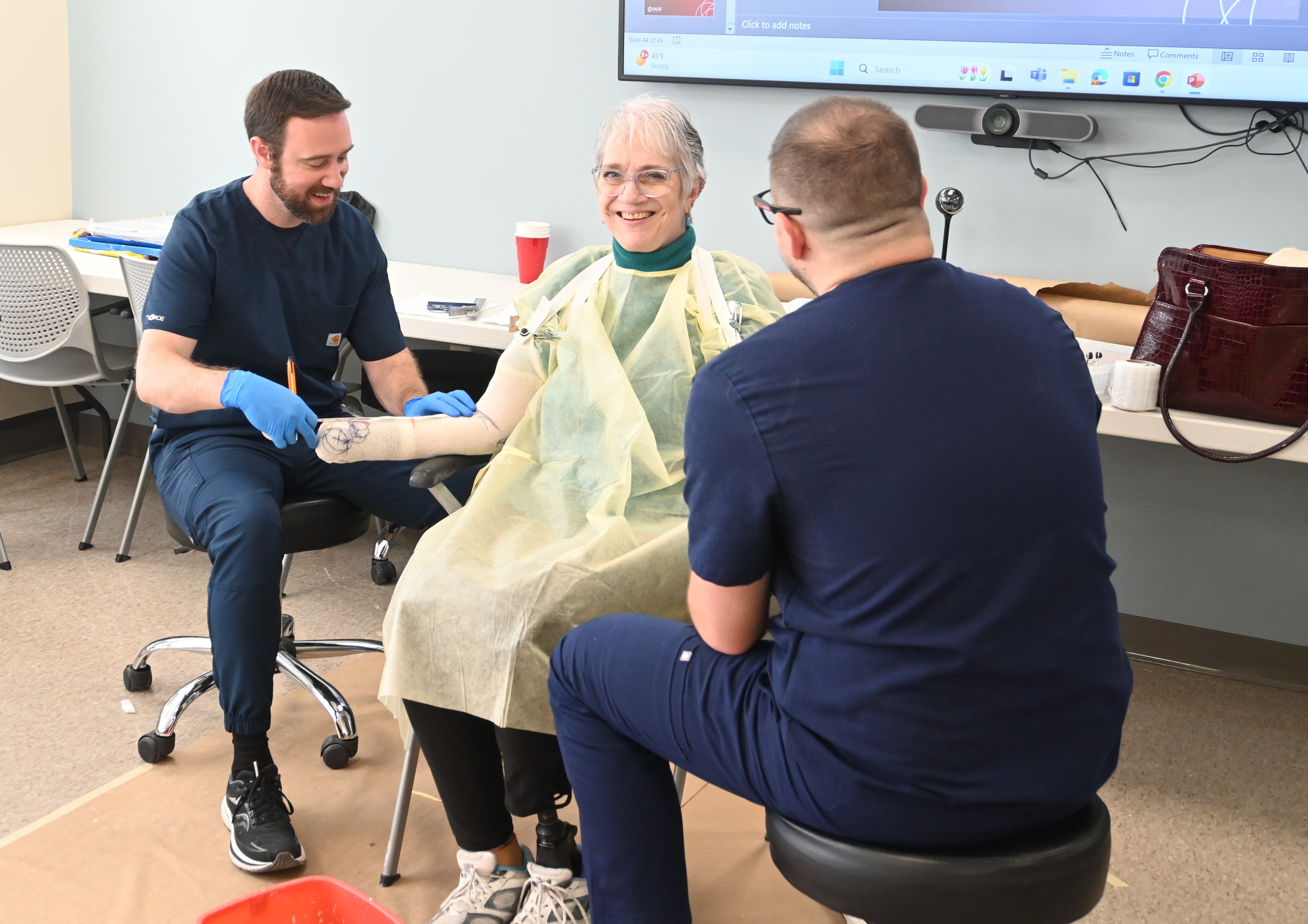 O&P patient model Beth Kase with students