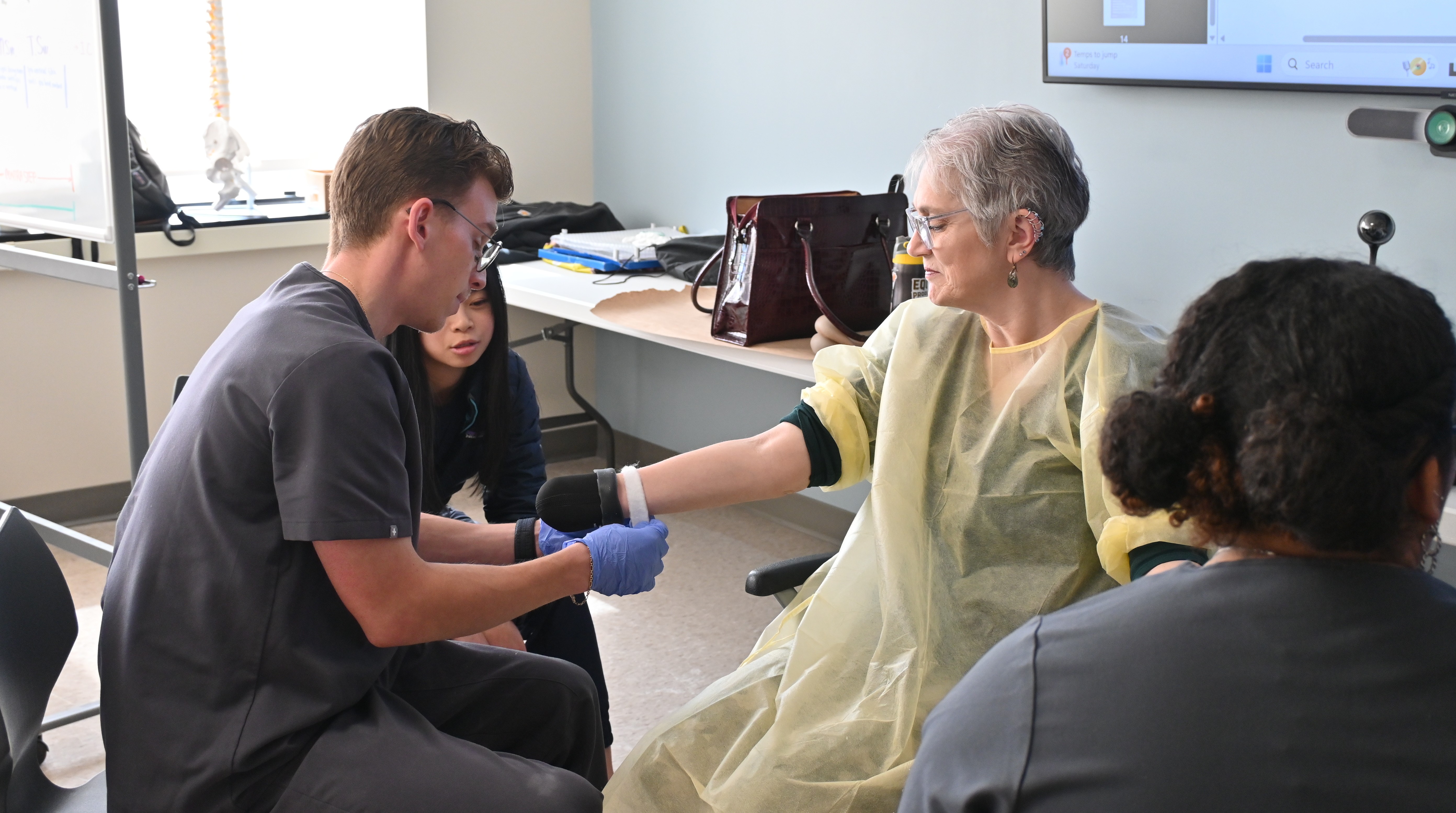 O&P student working with patient model in the lab pic1