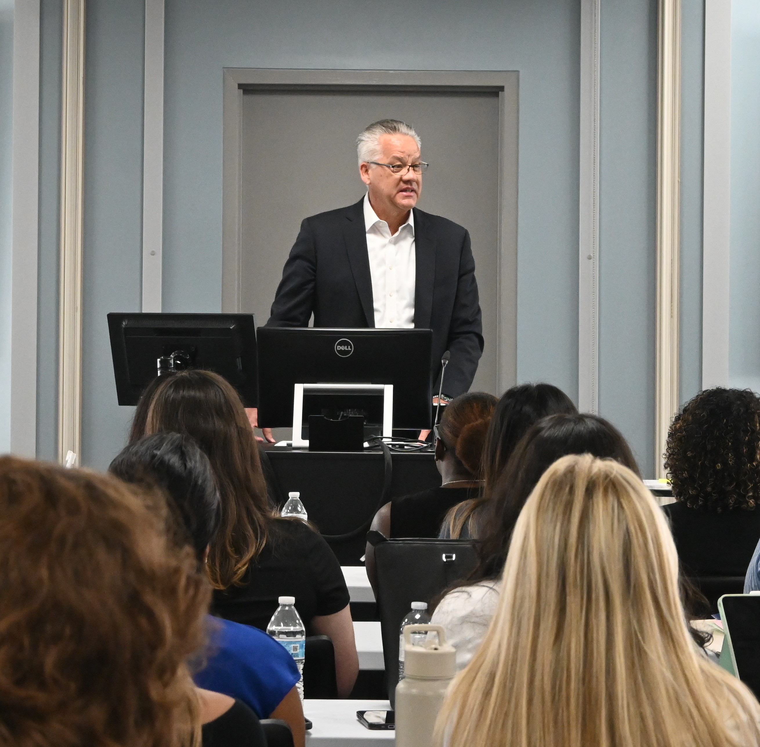 Provost Paul Jensen addresses students at orientation
