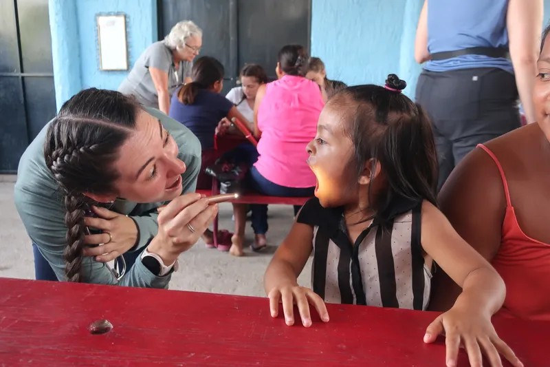 PA student examining Guatemalan toddler