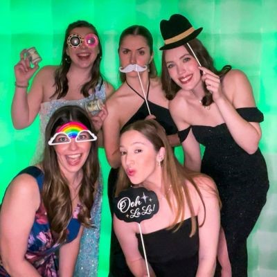 Women in the photo booth at Salus Soiree thumb1