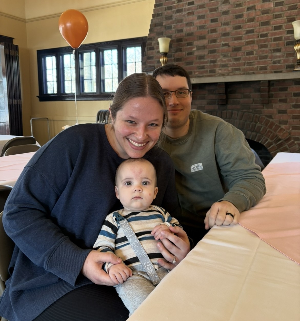 Sara Ostrowski, husband and baby