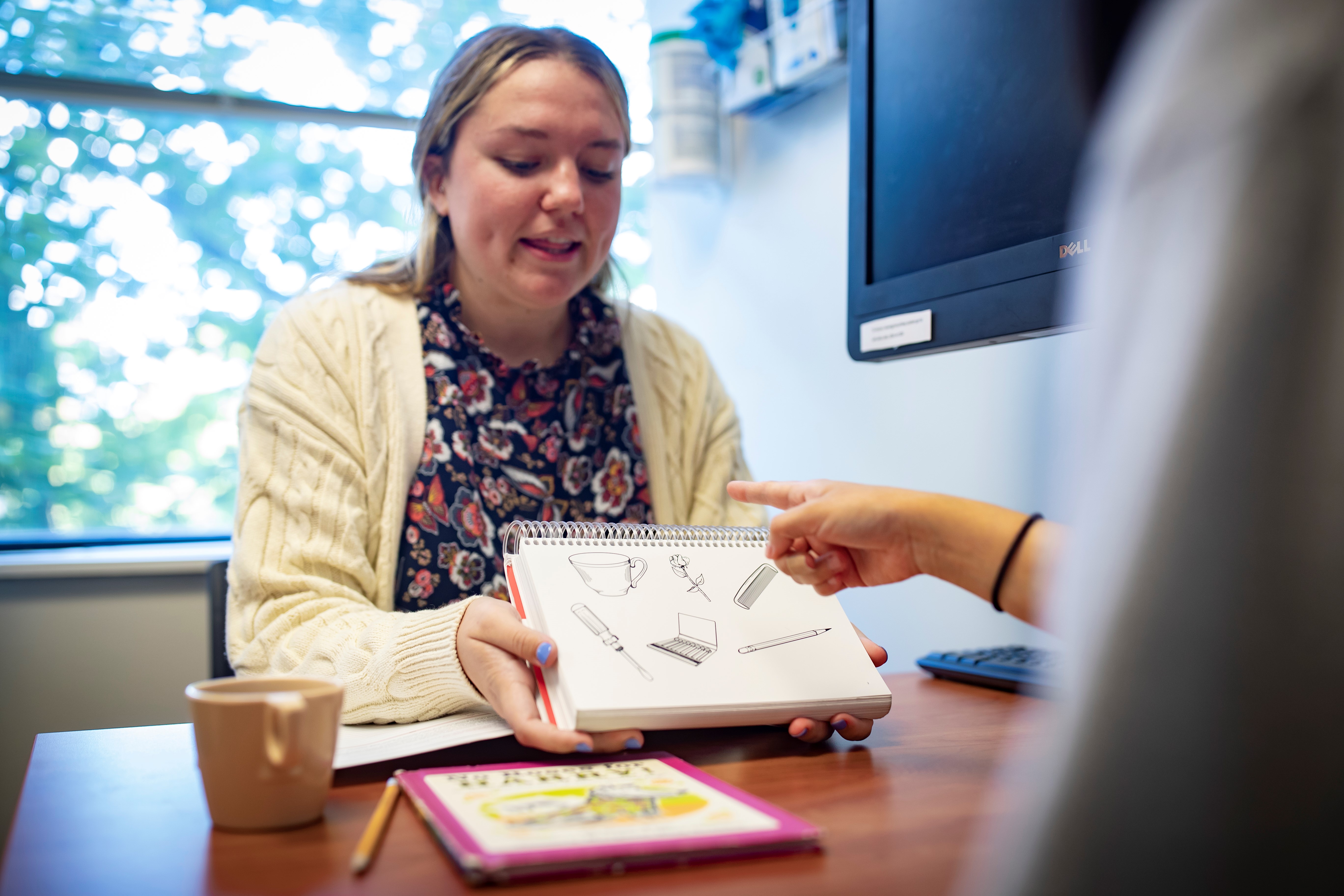 SLP student working with patient