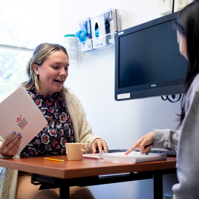 SLP student working with a client at SLI