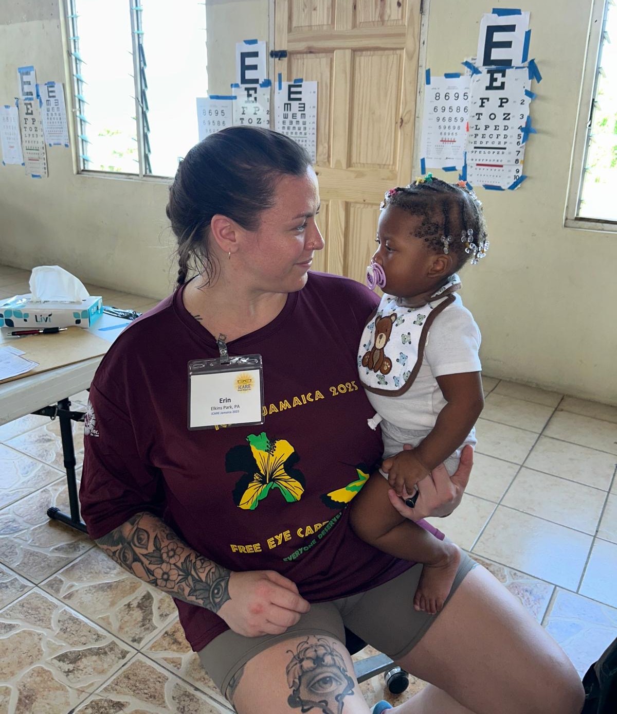 SOSH student holding Jamaican toddler pic2