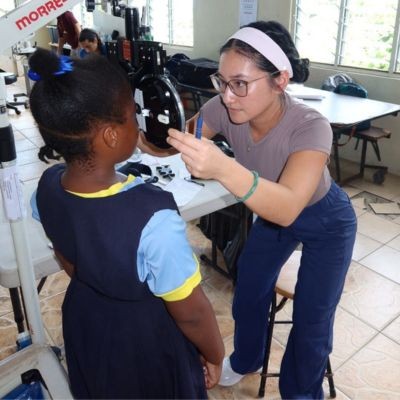 Kirsten Tran examining patient thumb1
