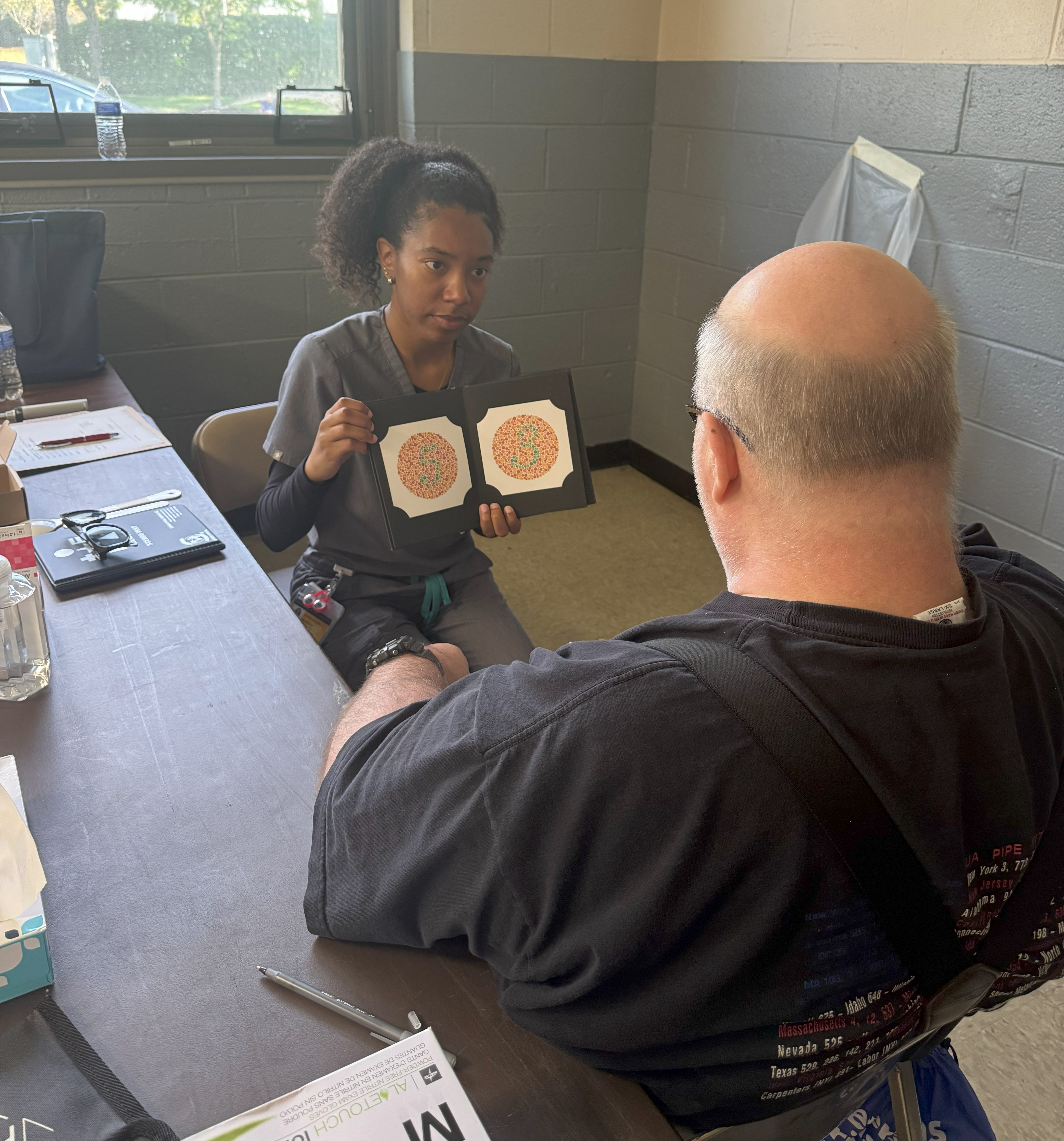 PCO student helping Stand Down patient pic1