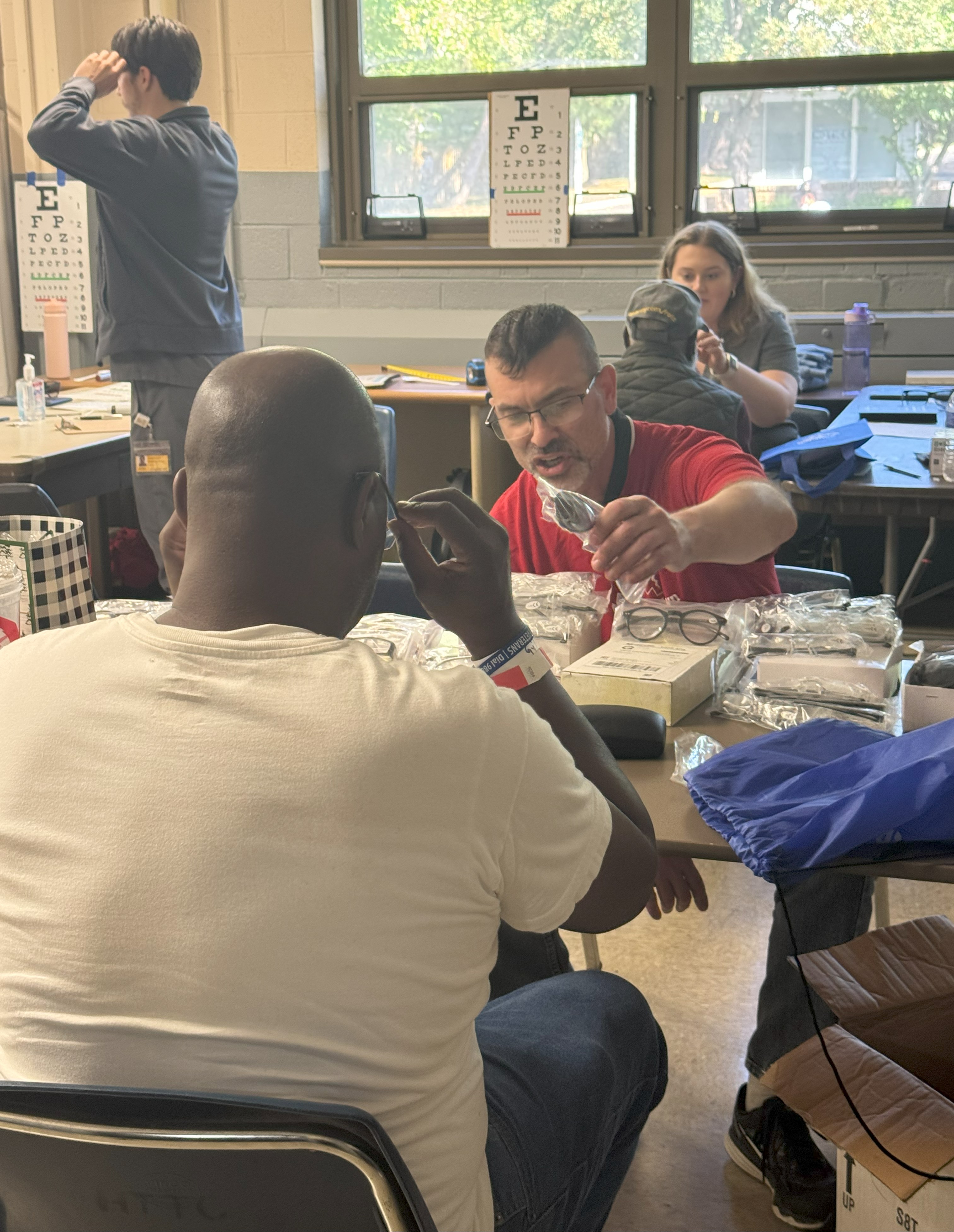 Dr. David Meltzer helping a patient at Stand Down