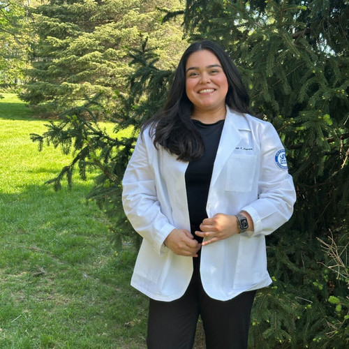 Mariah in her white coat