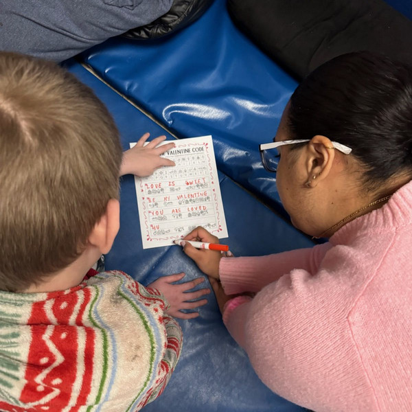 OT student working with student