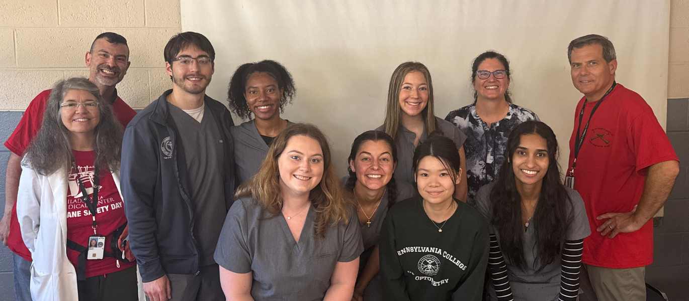 group photo of optometrists and students