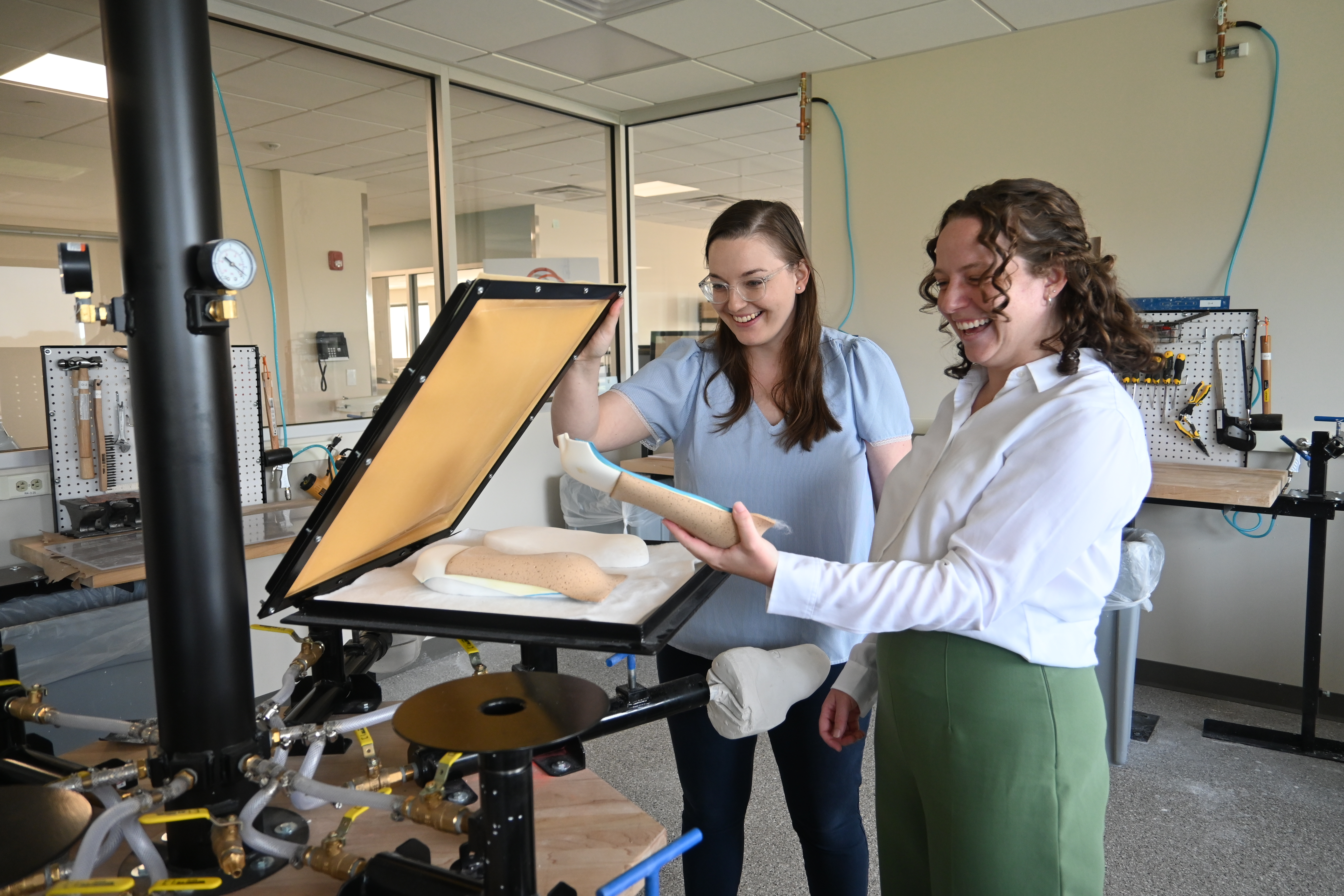 O&P faculty and student with tech in the lab