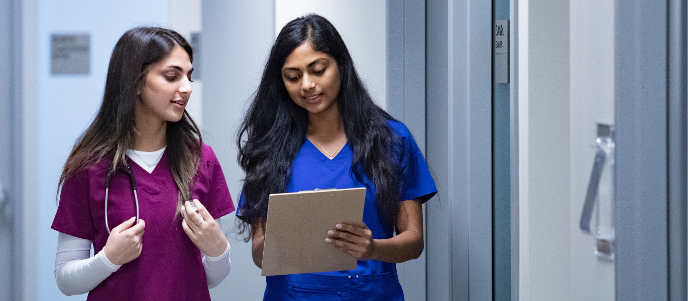 students walking down a hallway