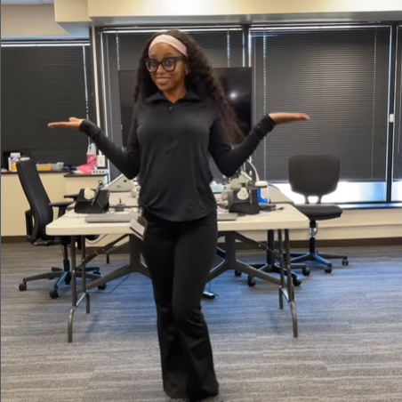 student standing in new audiology lab