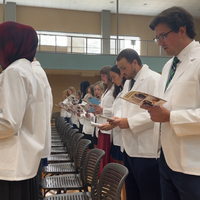 PA students reciting oath to professionalism