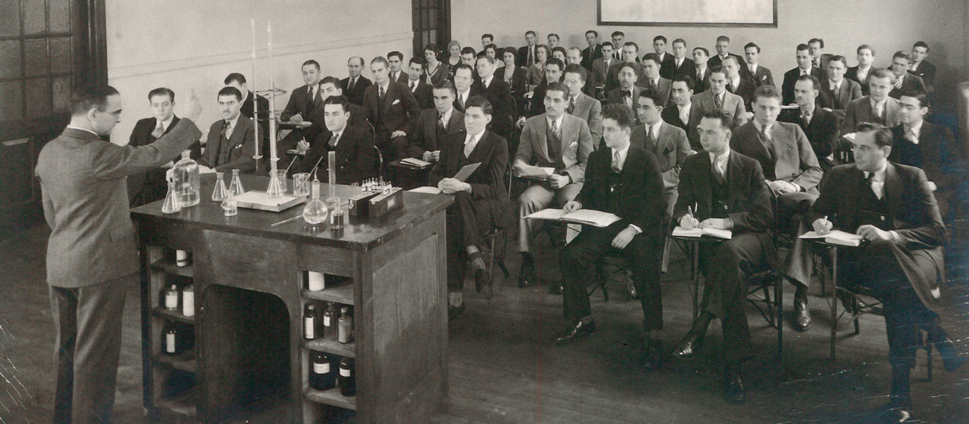 black and white photo of optometrists in class