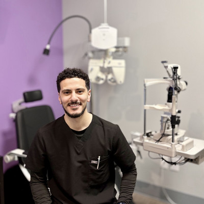 optometry student in an exam room