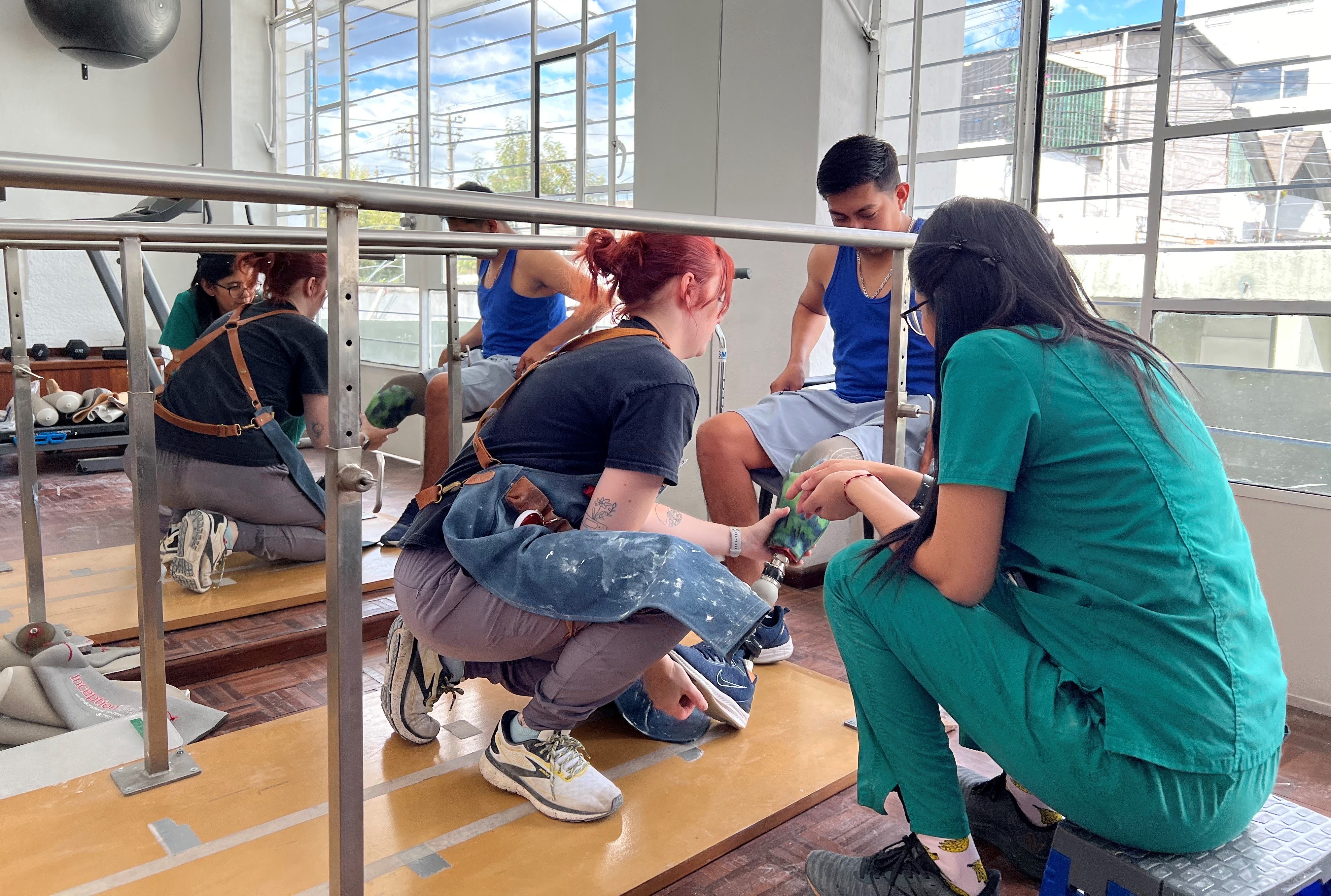 O&P students helping patient in Ecuador