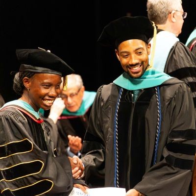 PCO grad Edward Harris and dean Dr. I thumb