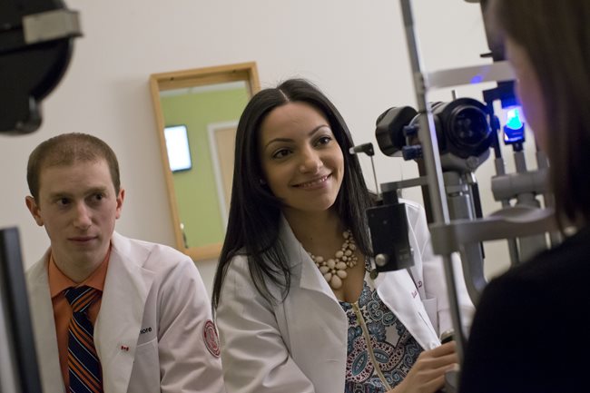 Dr. Labib with a student at TEI