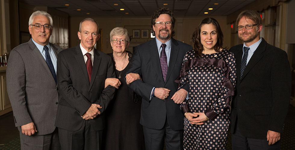 alums posing for a photo