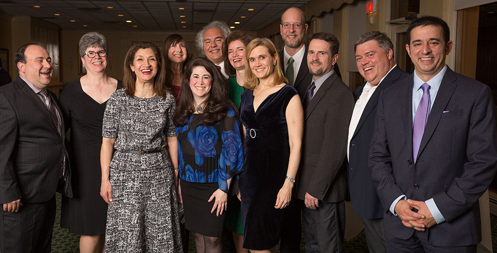 alums posing for a photo